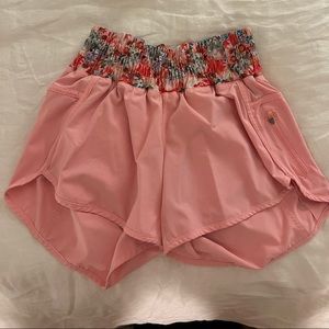 Lululemon pink shorts with floral waist band